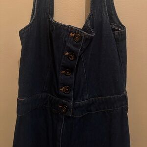 Full length dark wash denim jumper, bell bottom flare when worn!